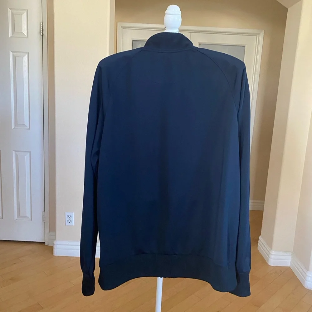 Nike Navy Blue Performance Jacket with Standing Collar and Full-Length Zipper